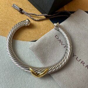 David Yurman's bracelet with a cross motif
